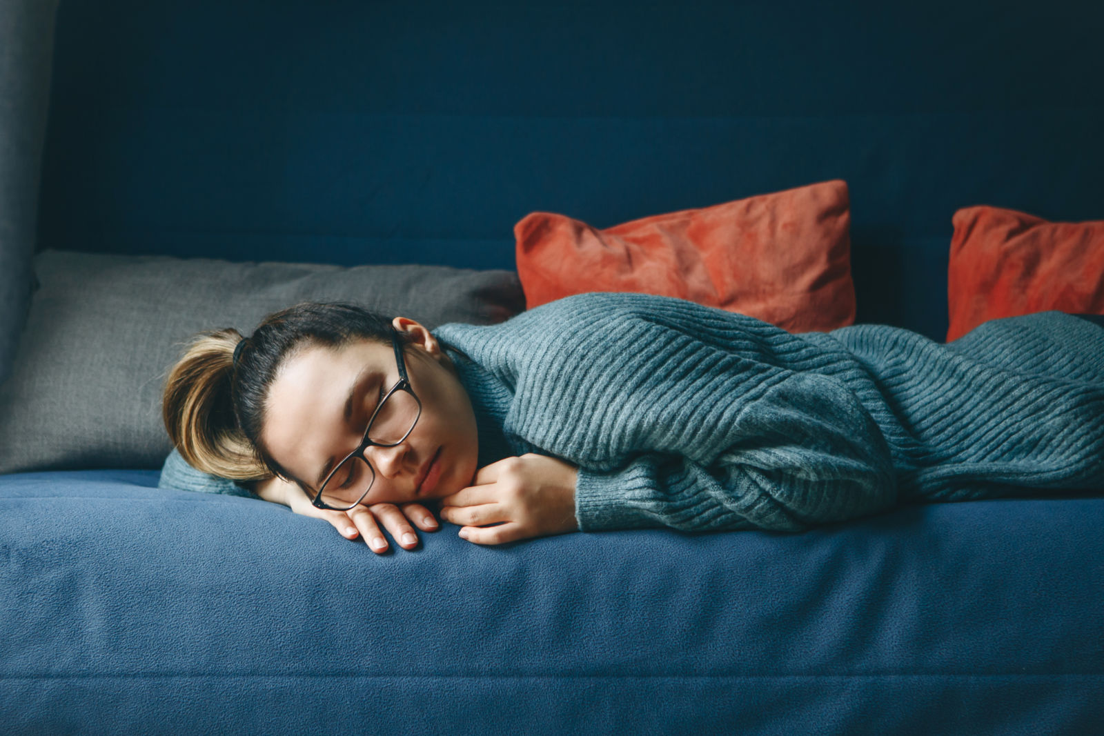 girl sleeping on couch